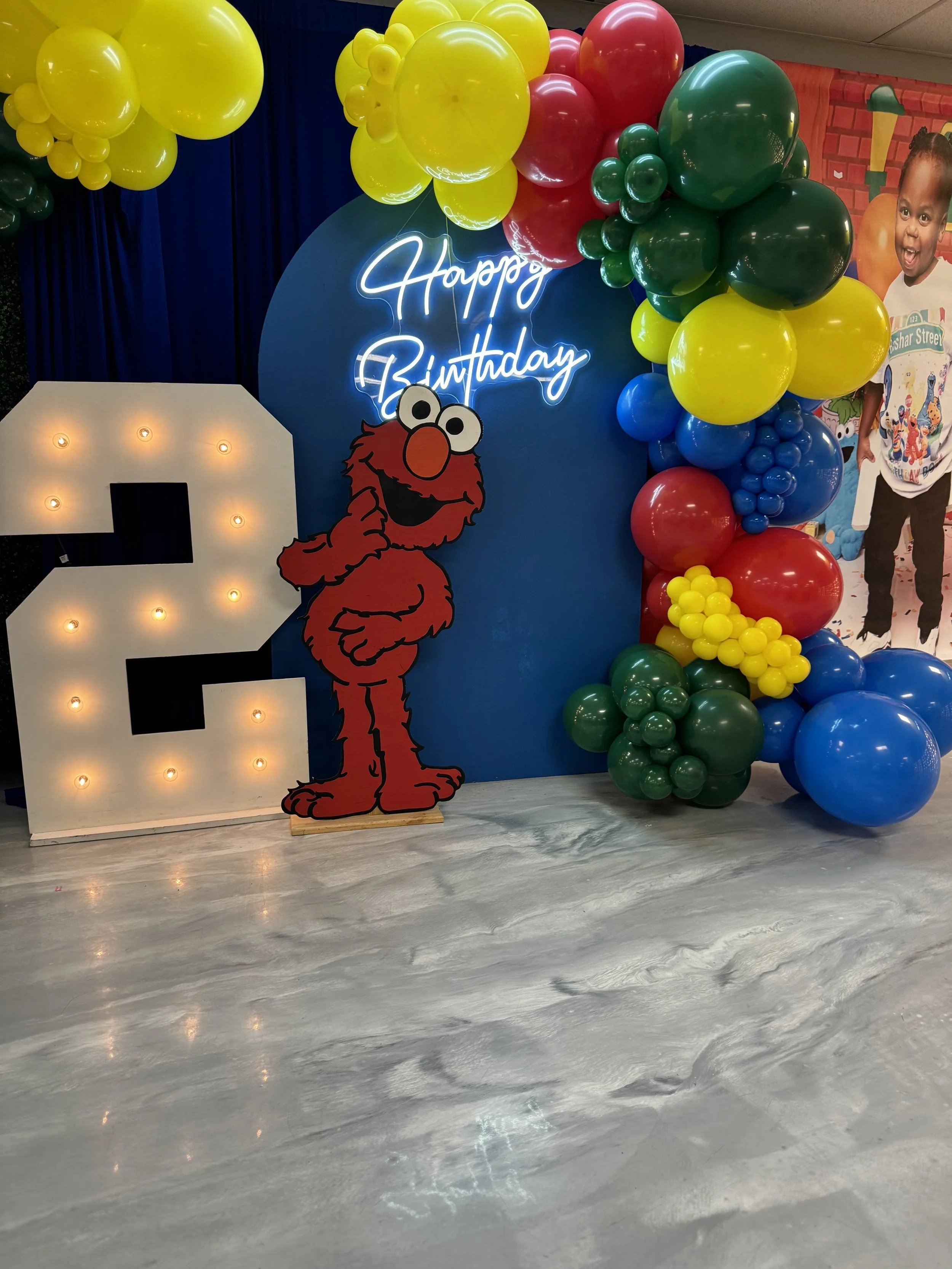 Balloon garland installation by Sharp Designs